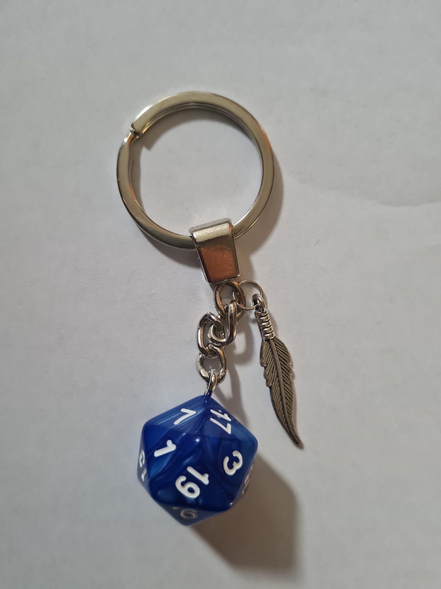 Keychain dark blue feather