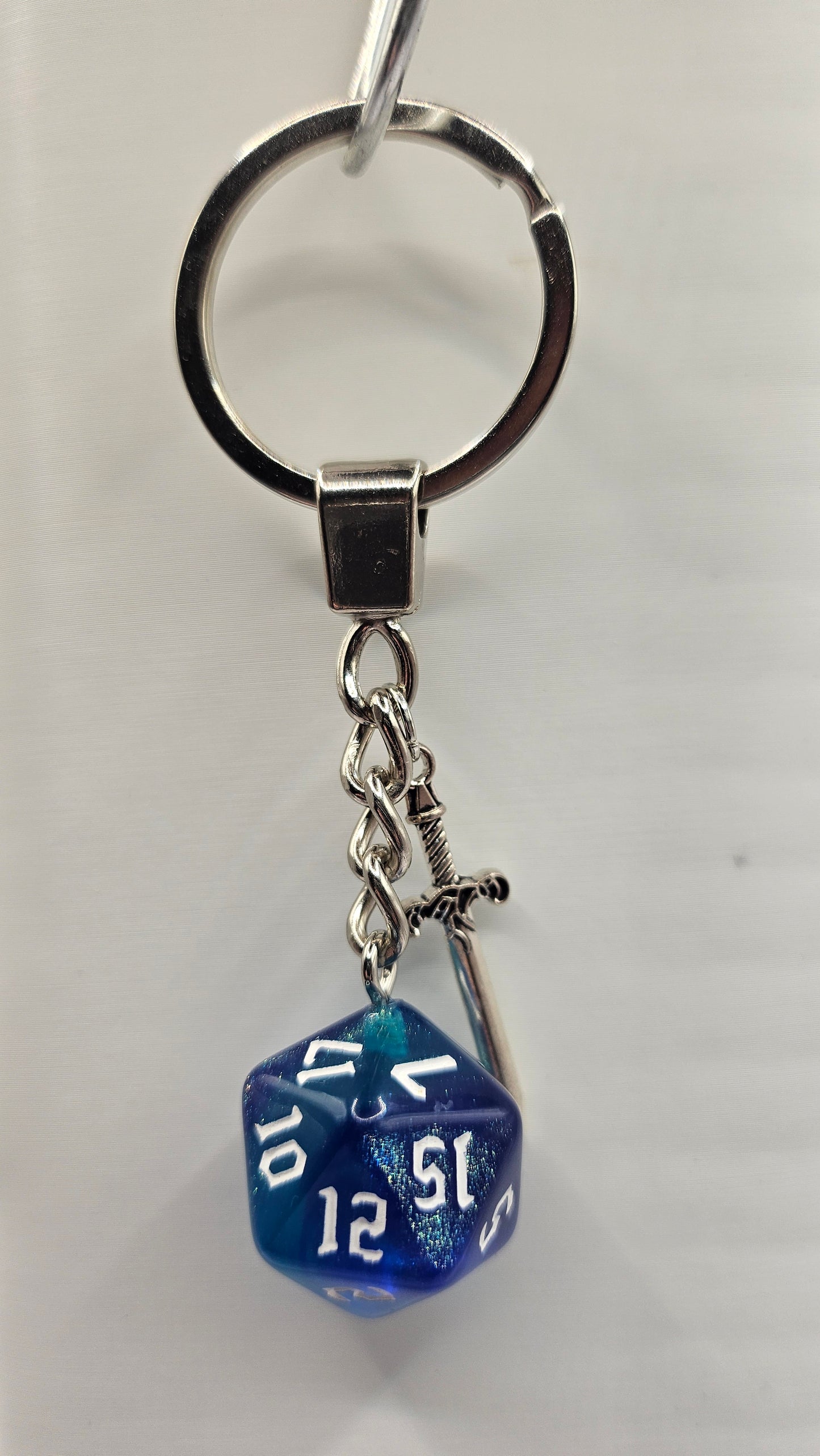 Keychain Glitter blue/green Sword